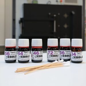 Dyne test inks with swabs for surface energy testing of contaminated surfaces